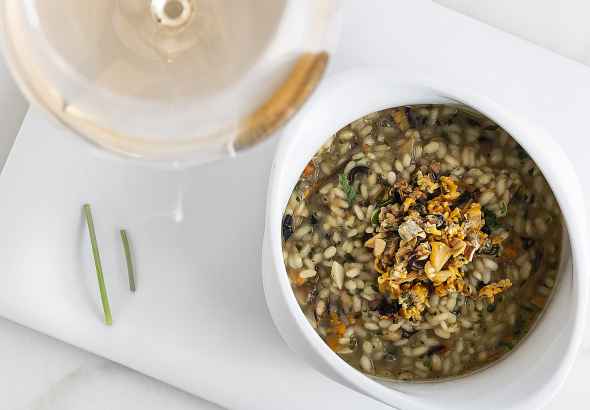 Creamy rice thickened with its salsa verde (garlic and parsley sauce)